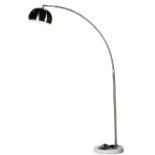 A stainless steel curved floor standing lamp, on a circular white and grey marble base.
