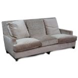 A contemporary three seat sofa,