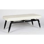 An ebonised bench, with splayed legs and white button-down linen seat, 127cm wide x 49cm high.