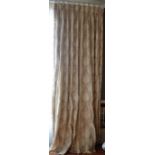 A pair of acanthus pattern cream silk curtains with onion tassel fringes. 125cm wide x 310cm long.