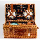 A 'Picnic Time' wicker picnic hamper, fitted for four persons, a small wicker hamper,
