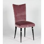 A vanity chair with black high gloss round tapering legs, upholstered in lilac velvet,