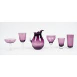 A suite of William Yeoward amethyst coloured glassware for six persons, the wine glasses only five,