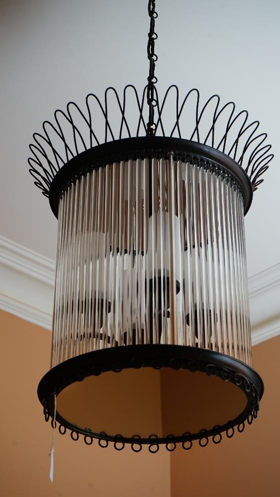 A pair of cylindrical black metal and tubular glass pendant light fittings, each of four lights, - Image 2 of 2