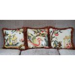 A set of three cushions, with multicoloured bird and Chinese pattern, in 18th century style,