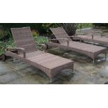 Expormim; a pair of pool side reclining loungers with loose green cushions,