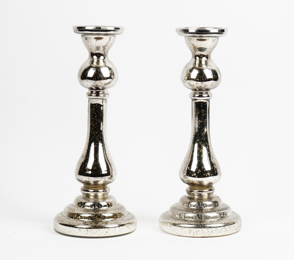 A pair of mercurial glass candlesticks.
