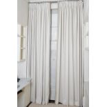 A pair of ivory snakeskin fabric curtains, with ivory and beige edgings. 95cm wide x 310cm long.
