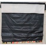 A Roman blind in dark blue with a colourful lower border. 125cm wide x 200cm long.