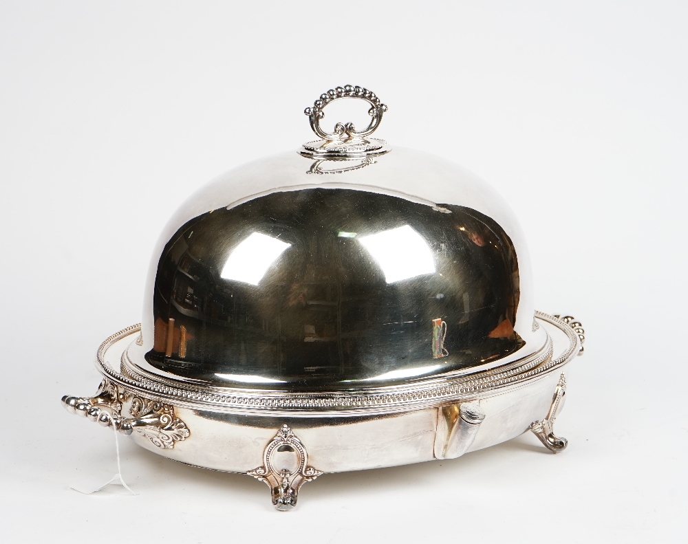 An electroplate oval meat dish cover, with beaded borders,