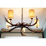 A five light chandelier composed of antlers, approximately 105cm diameter.