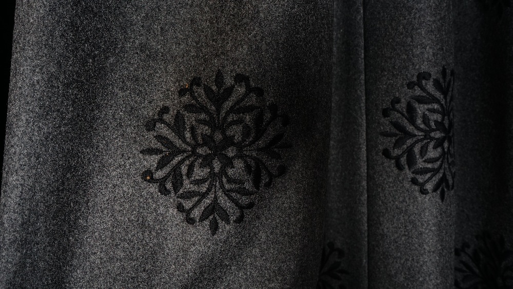 A pair of dark heather grey wool fabric curtains with black embroidered medallions, - Image 3 of 4