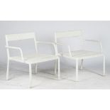 Exporimim; a set of four white woven low armchairs and two low egg shape tables,
