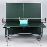 A Butterfly slim line indoor folding table tennis table.