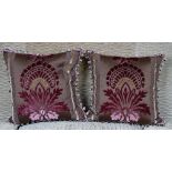 A pair of purple and old gold cut velvet cushions (2).