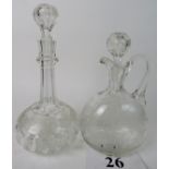 A late 19th/early 20th century cut glass claret jug and similar period cut glass decanter,