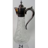 An early 20th century silver plated mounted lead crystal claret jug,