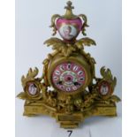 A pretty 19th century French gilt-metal and pink ground porcelain mantel clock,