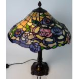 A modern Tiffany-style table lamp,