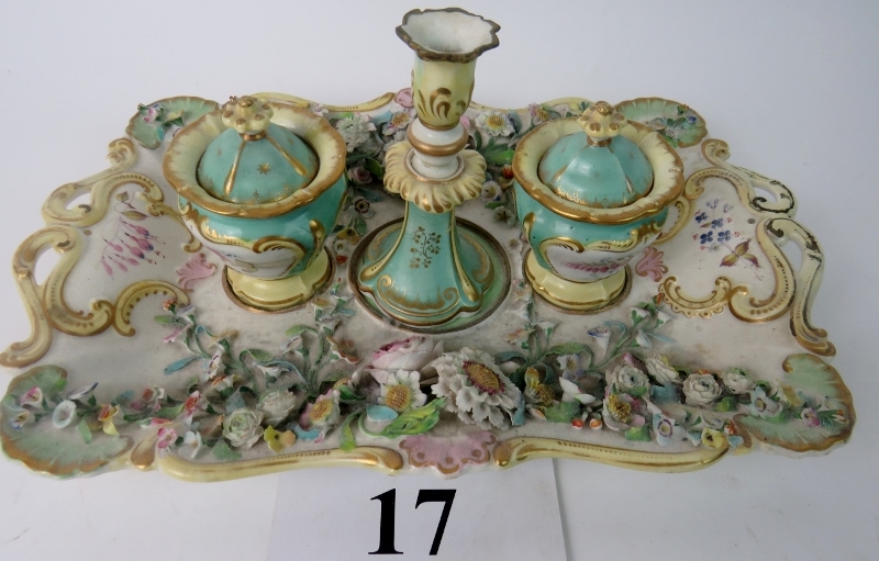A pretty 19th century porcelain desk stand, incorporating a candleholder and 2 covered pots,