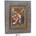 A 19th century glass miniature panel depicting a religious scene, within carved frame, 23cm high,