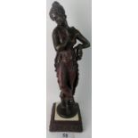 A decorative bronzed figure modelled as an ancient Grecian maiden, a stylish base, 72cm high,