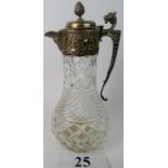 An early 20th century silver plated mounted moulded glass claret jug,