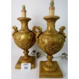 A pair of Italian classical style giltwood table lamps in the form of ancient urns, modern,