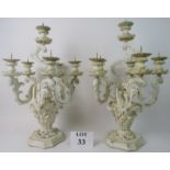 A pair of Italian rococco-style painted wooden candelabra, modern, 56cm high,