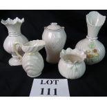 A collection of Belleek vases, the talle