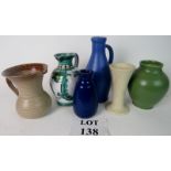 Three studio pottery vases and two jugs,