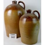 Two stoneware pots with stoppers, 50 cm