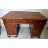 A 20th century pedestal desk with a brow