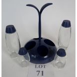 A Guzzini condiment set, est: £20-£40