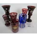 A selection of coloured cut glass, some