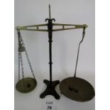 A set of antique cast iron scales with b