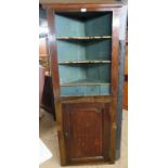 A 19th century oak corner cabinet with 2