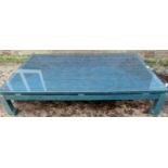 A large 20th century low coffee table wi