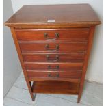 Edwardian music chest in mahogany with 5 drawers with drop down fronts and a shelf beneath,