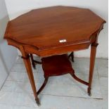 An Edwardian mahogany inlaid centre table with crossbanded top over square tapering legs and