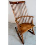 An 18th century country half hoop Windsor rocking chair,