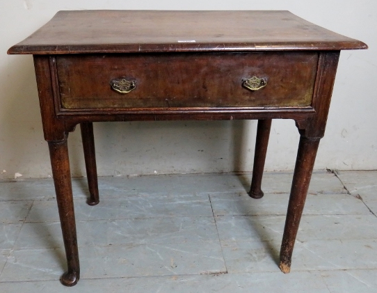 A fine 18th century oak side table with long frieze drawer over pad feet, a/f,
