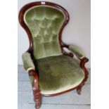 Victorian mahogany show-wood framed open armchair in buttoned green upholstery,