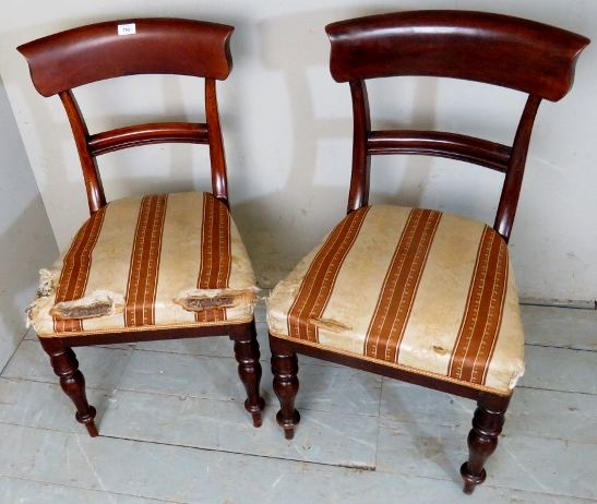 A pair of Victorian mahogany chairs with cream and bronze upholstery,