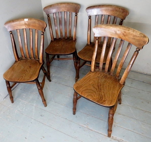 A set of 4 late Victorian elm seated kitchen chairs,