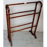 An Edwardian mahogany freestanding towel rail in good condition,