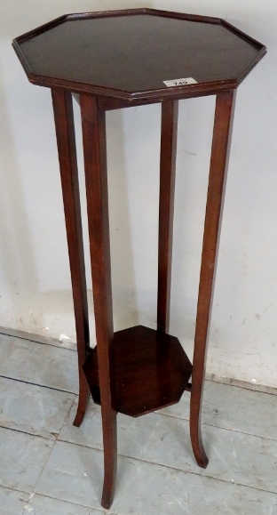 An Edwardian mahogany jardiniere stand with shelf beneath,