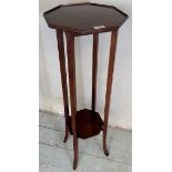 An Edwardian mahogany jardiniere stand with shelf beneath,