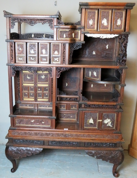 A fine quality Meiji period Japanese display cabinet, with shibayama filigree and carved panels,