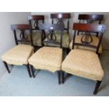 A set of six Georgian mahogany lyre back dining chairs for re-upholstery,